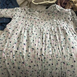 Ankle length white based dress with flowers